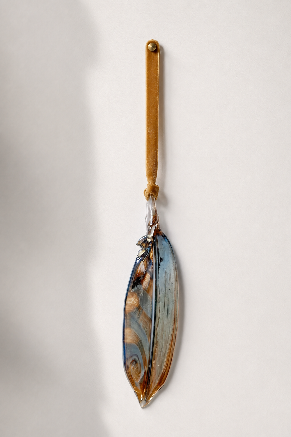 Metallic Glass Feather — ivory wall photograph